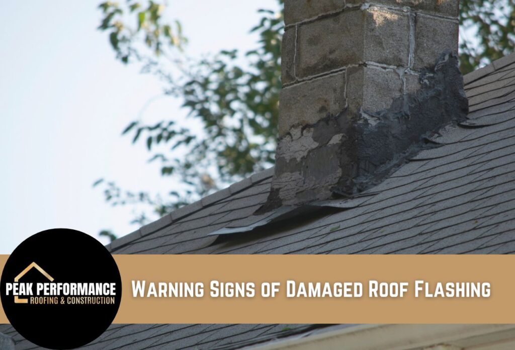Damaged roof flashing around brick chimney showing warning signs of deterioration